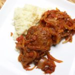 Turkey with tomato caramelized onions